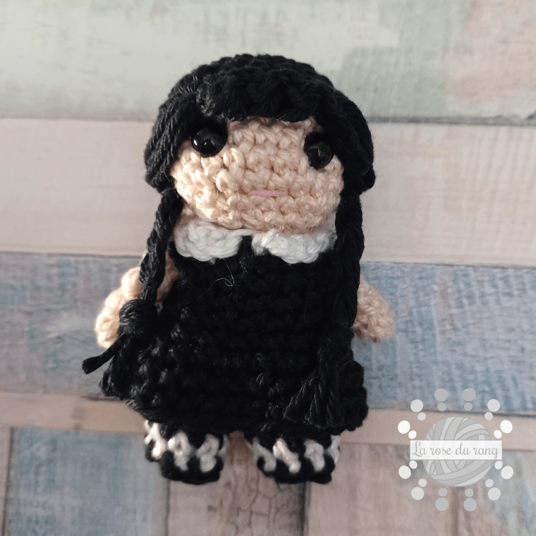 Wednesday Addams fan art crochet doll by La rose du rang
