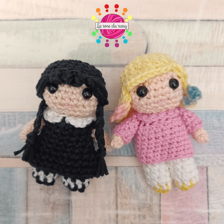 Wednesday Addams and Enid Sinclair fan art crochet dolls by La rose du rang